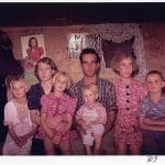 A family of 7 seated together